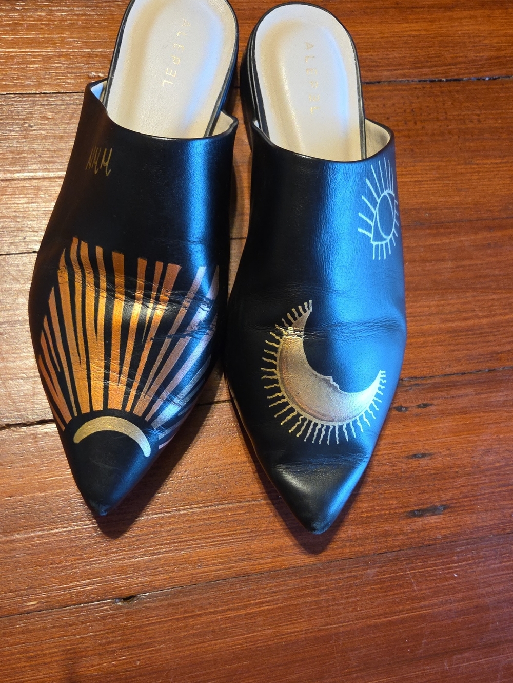 Alepel Black Leather Pointed Mules with Gold Sun & Moon Design